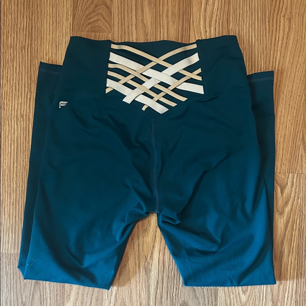 Fabletics Dark Teal Leggings with White Cross Design